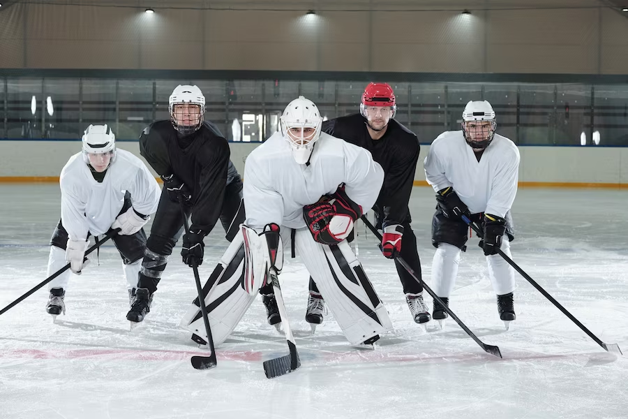 Hockey team fully equipped on a hockey field